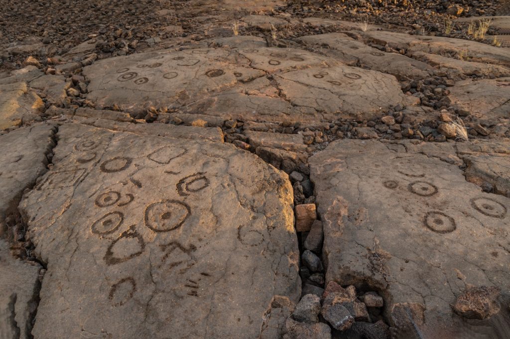 There are several theories about the meaning behind Hawaiian petroglyphs