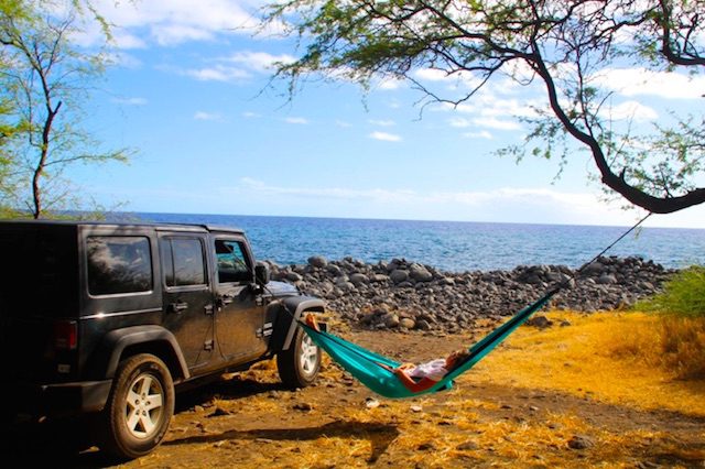 Jeep a car parked on a beach