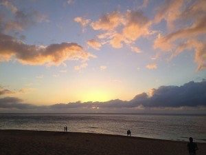 a sunset over a body of water