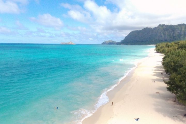 a beach next to a body of water