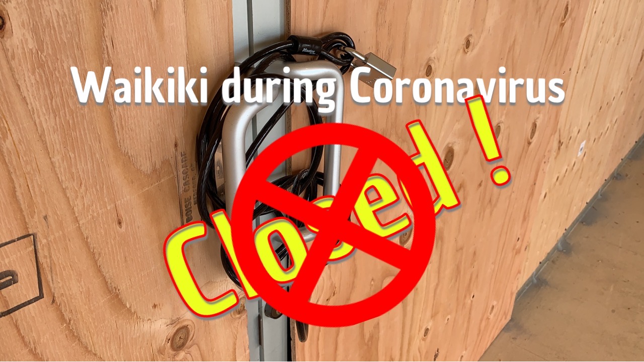 Coronavirus Waikiki – Waikiki CLOSED a sign on a wooden pole