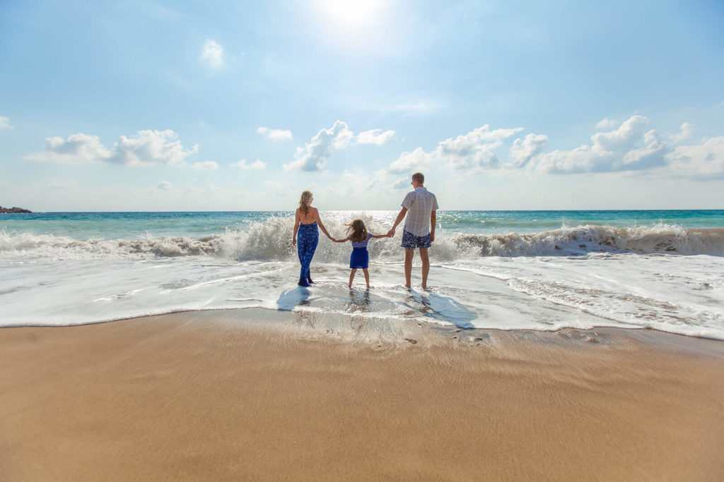 main1-1024×683 a boy and girl walking on a beach
