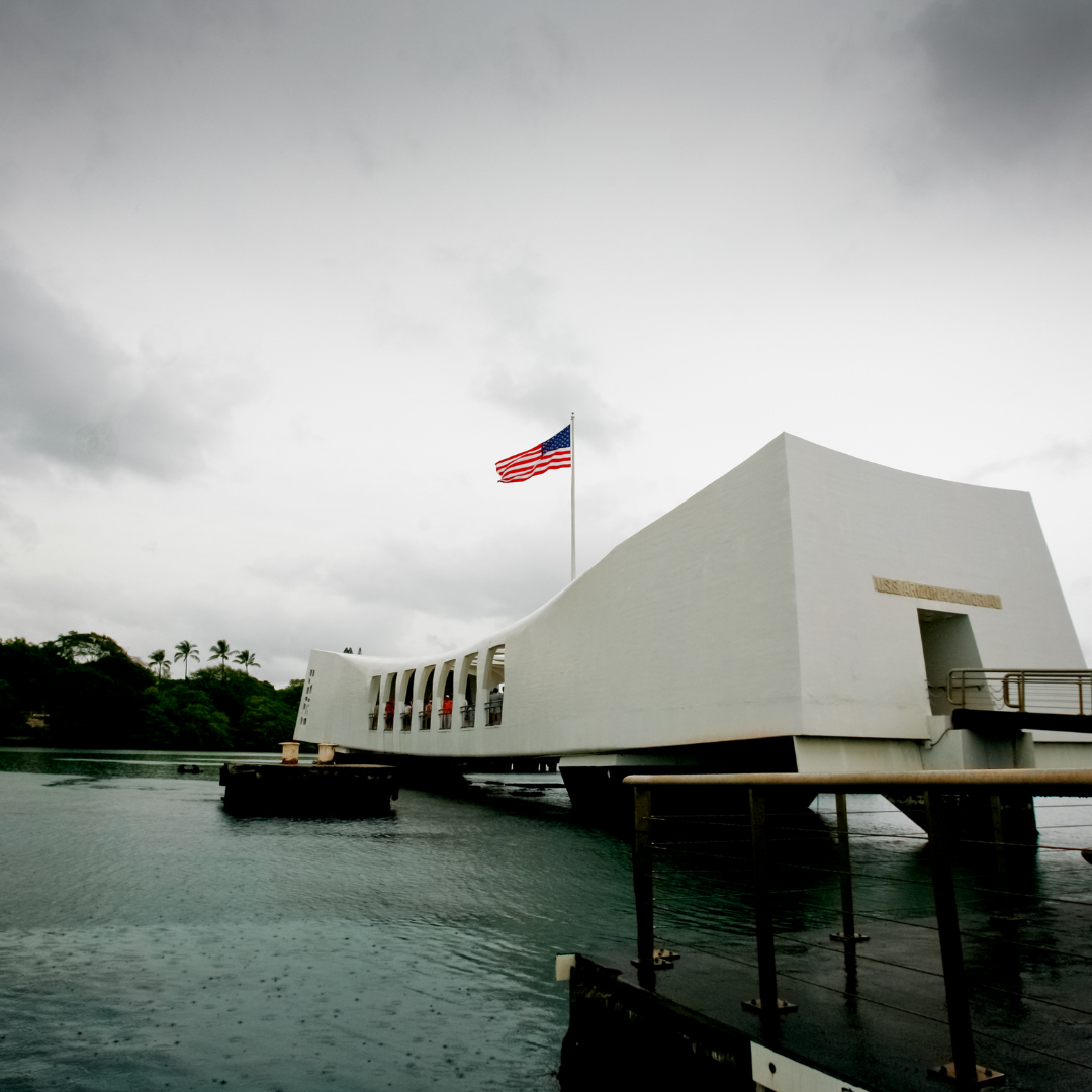 Pearl Harbor Memorial a small boat in a large body of water
