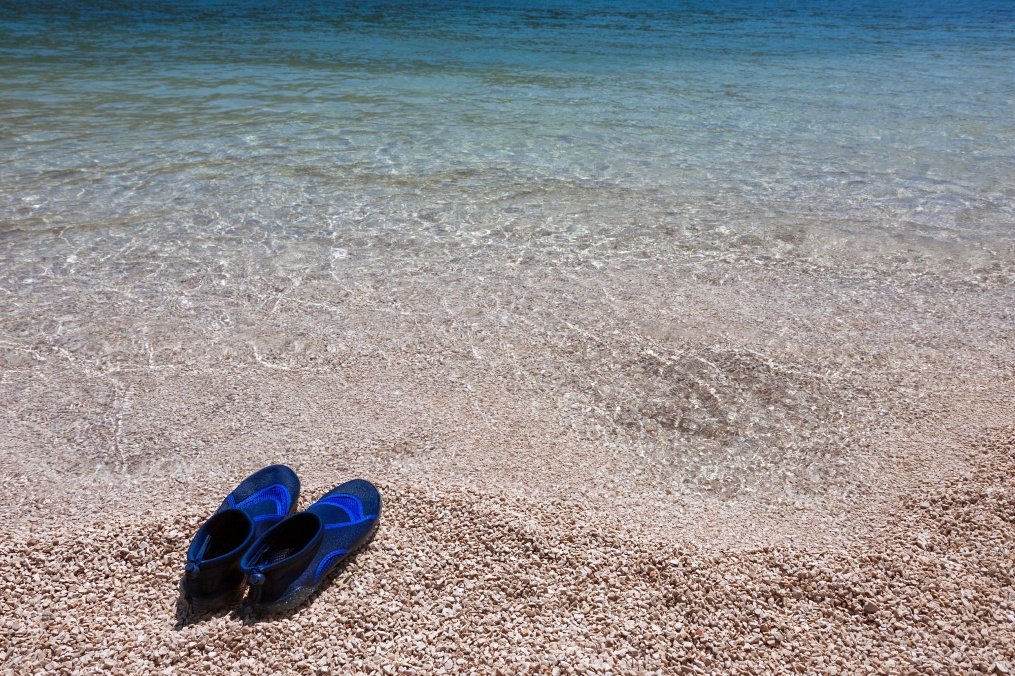 a person sitting at a beach