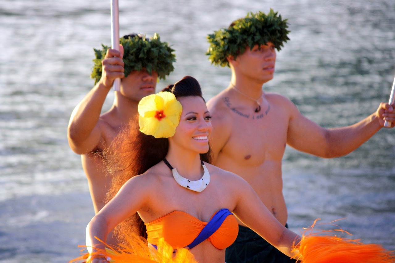 Hawaiian Language a person standing next to a body of water
