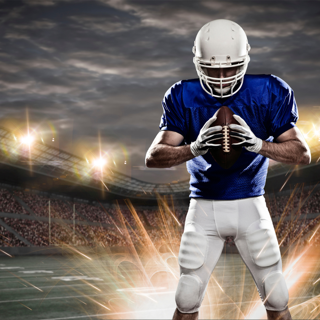 Football PLayer a man wearing a helmet holding a football