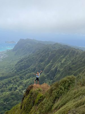 a man standing on top of a mountain