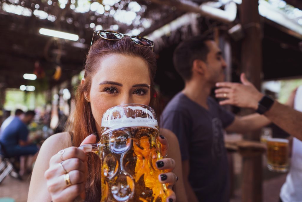fabio-alves-m5tLEszuNu0-unsplash-1024×683 a person drinking from a glass