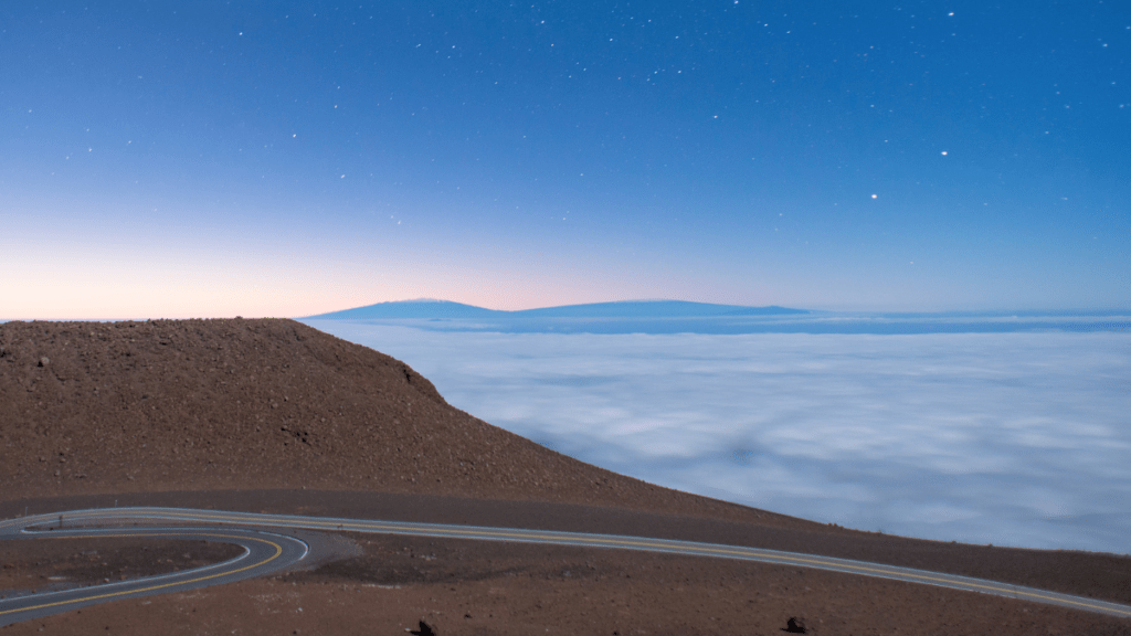 Haleakala-1-1024×576 a man riding on top of a mountain