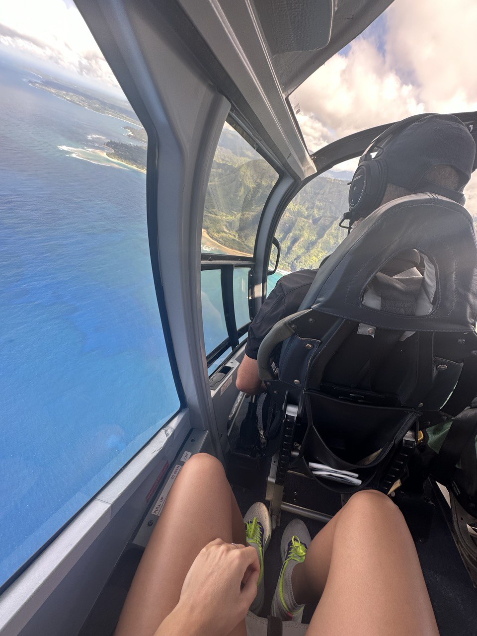 Helicopter Flights a person sitting on the seat of a car