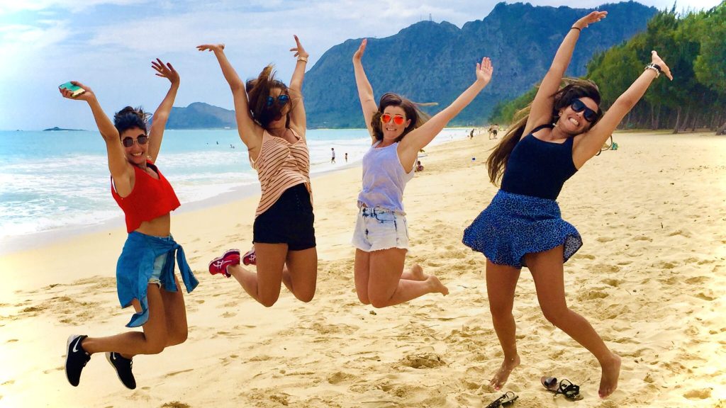a group of people on a beach