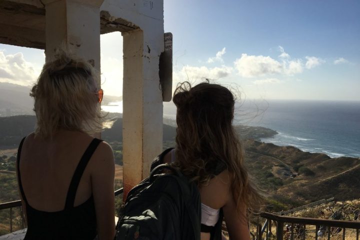 a woman standing in front of a building