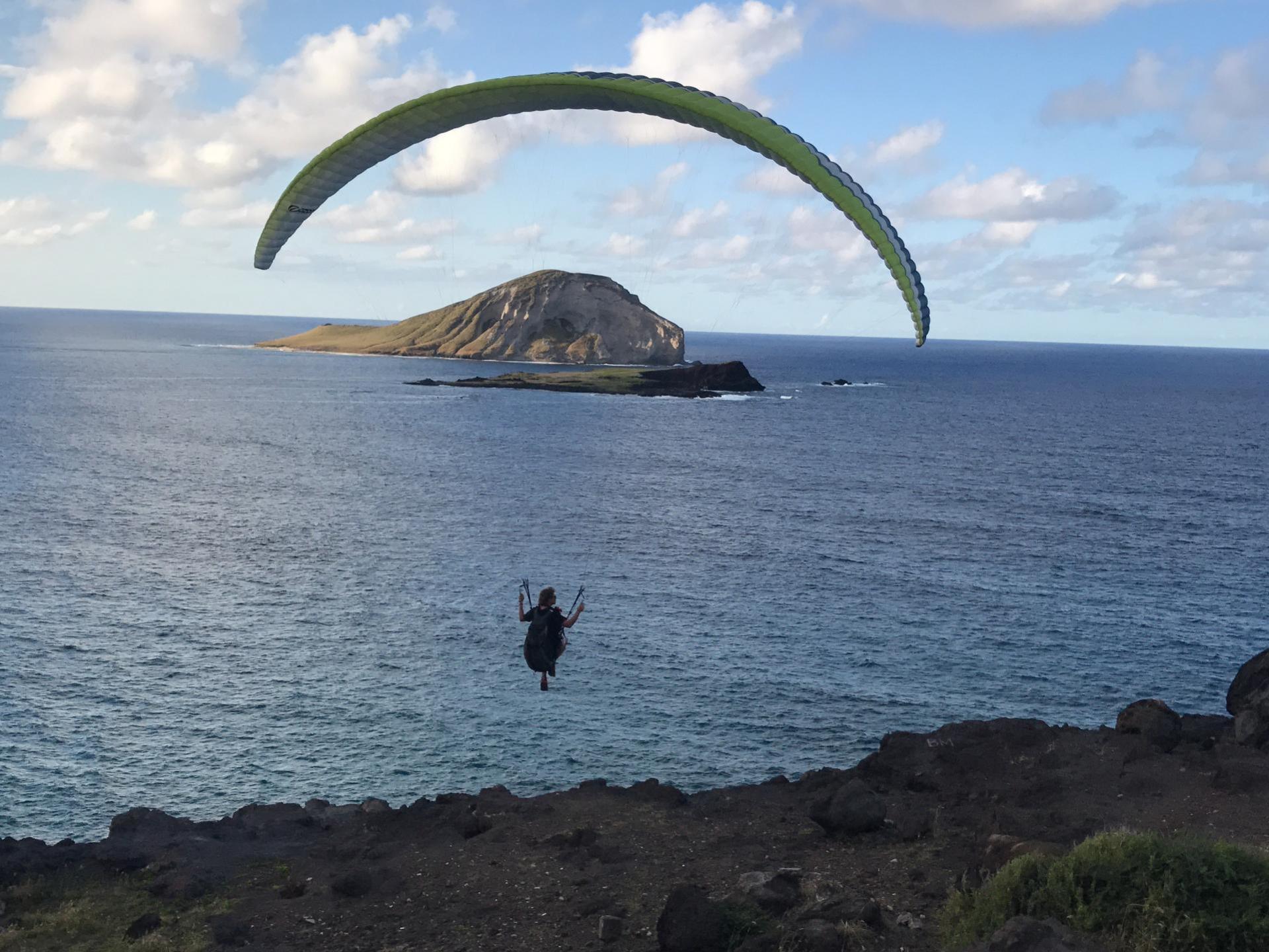 a rocky shore next to a body of water