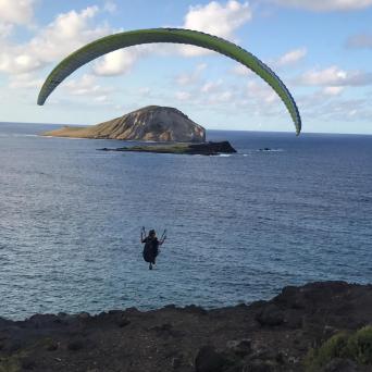 a rocky shore next to a body of water