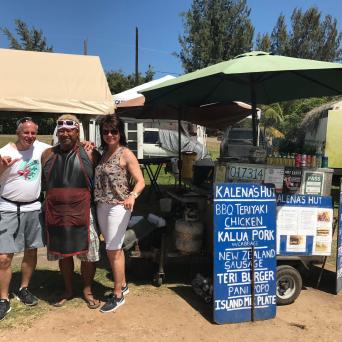 a group of people standing in front of a building