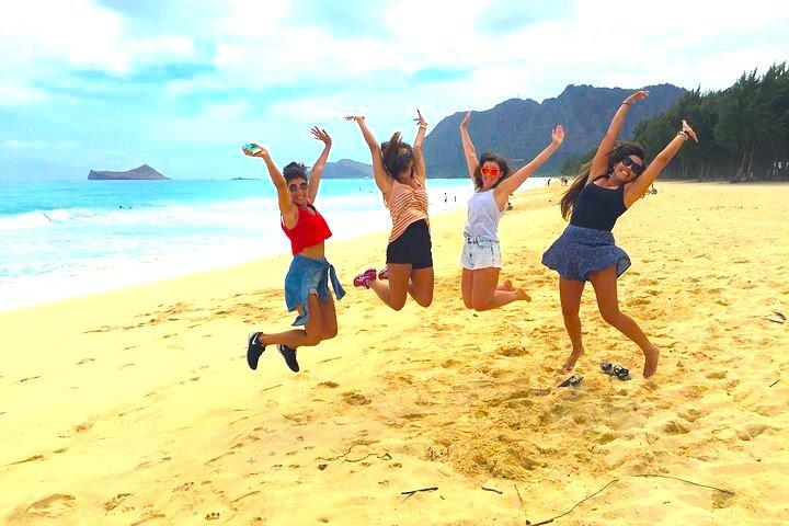 a group of people on a beach