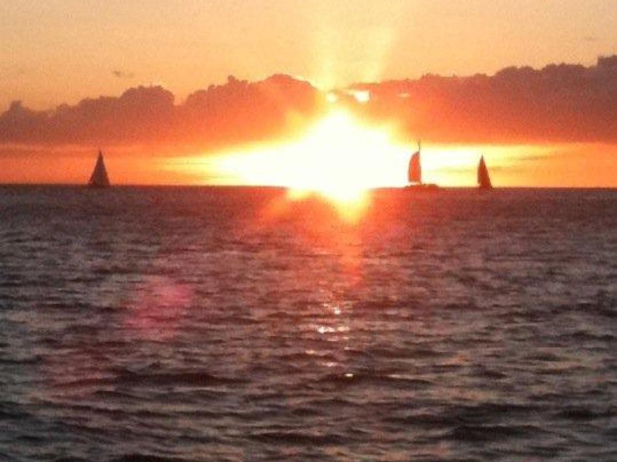 a sunset over a body of water