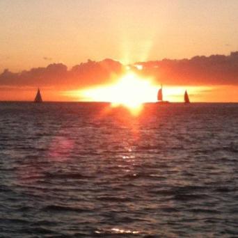 a sunset over a body of water