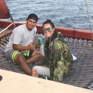 Henry Blanco sitting in a boat on a body of water