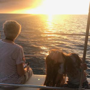 a person standing in front of a body of water