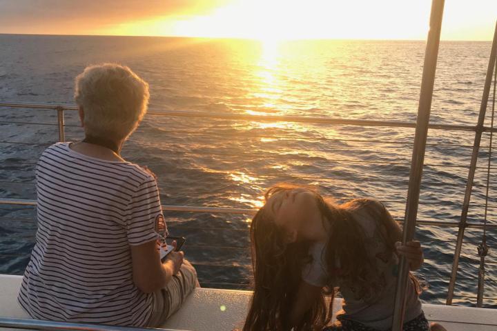 a person standing in front of a body of water