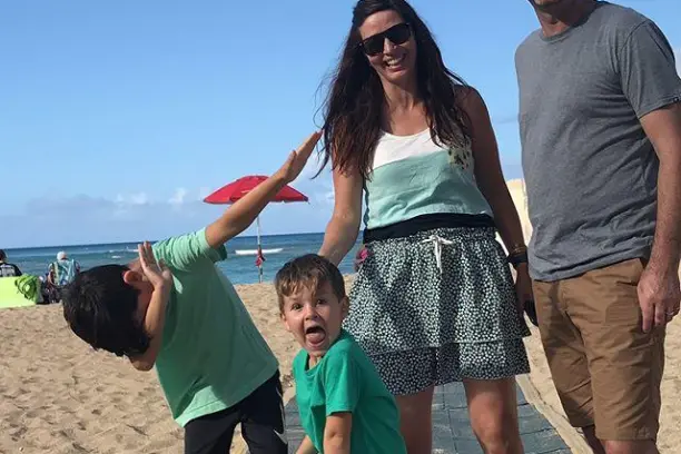 a group of people on a beach