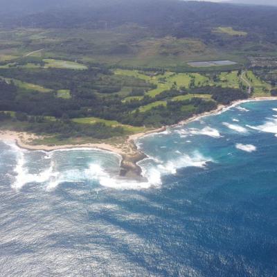 a view of a body of water with a mountain in the background