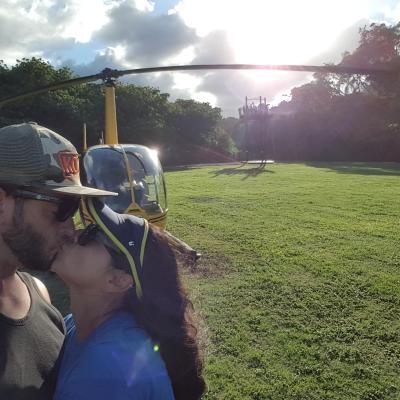 a man that is standing in the grass