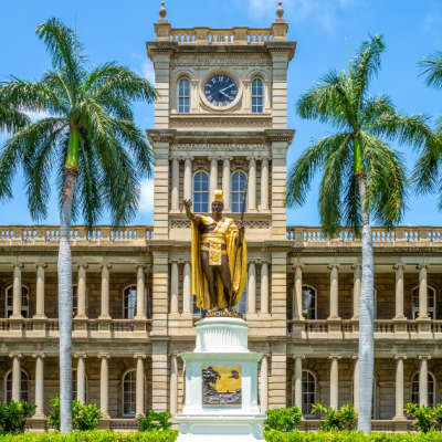 a large clock tower in front of a building