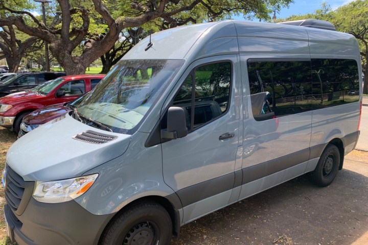 a van parked on the side of a road
