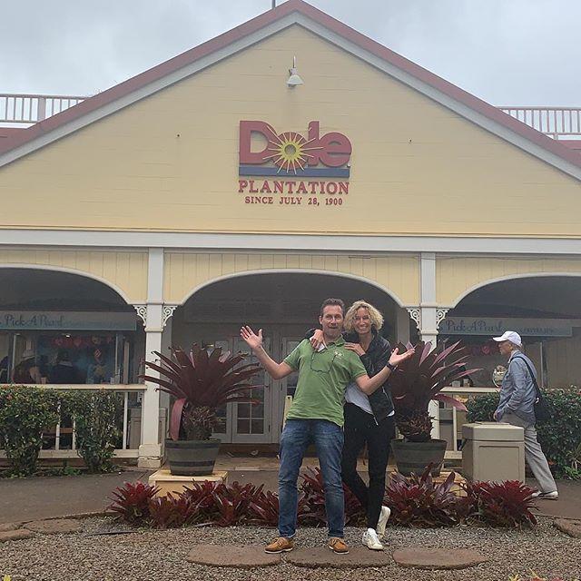 a group of people standing in front of a building