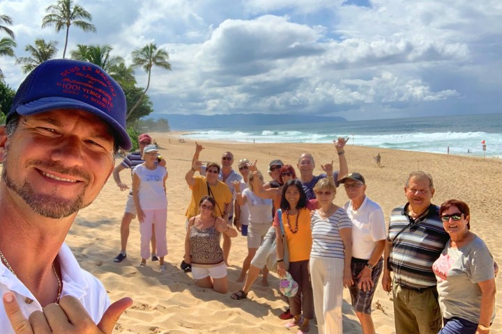 a group of people on a beach