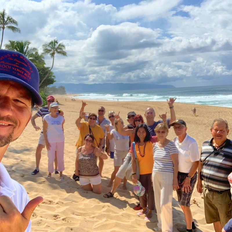 a group of people on a beach