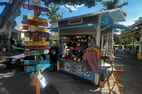a group of people standing in front of a store