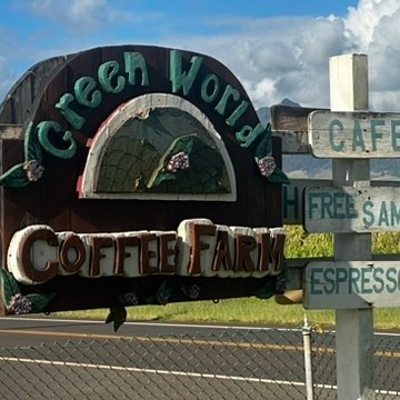 a sign on the side of a fence